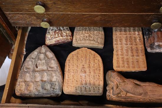 Three cabinets containing Indian stupa